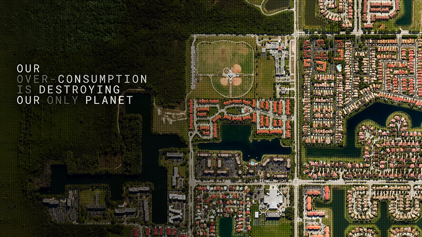 An overhead shot of landscape, with abstract images of buildings below. Text to the left of the image says 'our over consumption is destroying our only planet'