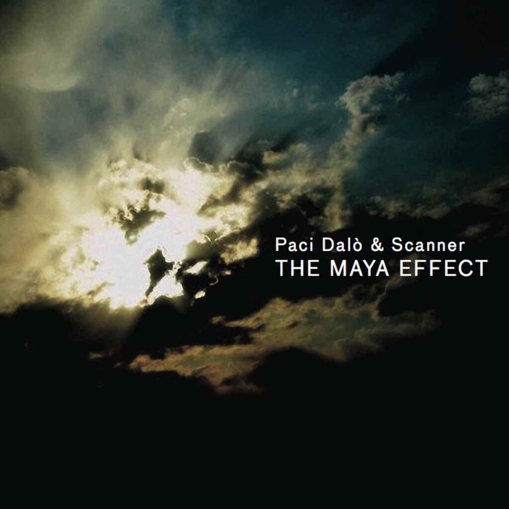 A CD cover. Image shows a very dramatic photograph of a cloudy sky with the sun trying to break through the clouds. The text on the right reads Paci Dalo and Scanner The Maya Effect