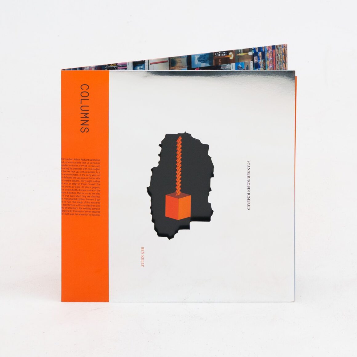 Record cover with COLUMNS written on an orange stripe, beside a silver/white space, with a hole cut in it and an orange object inside