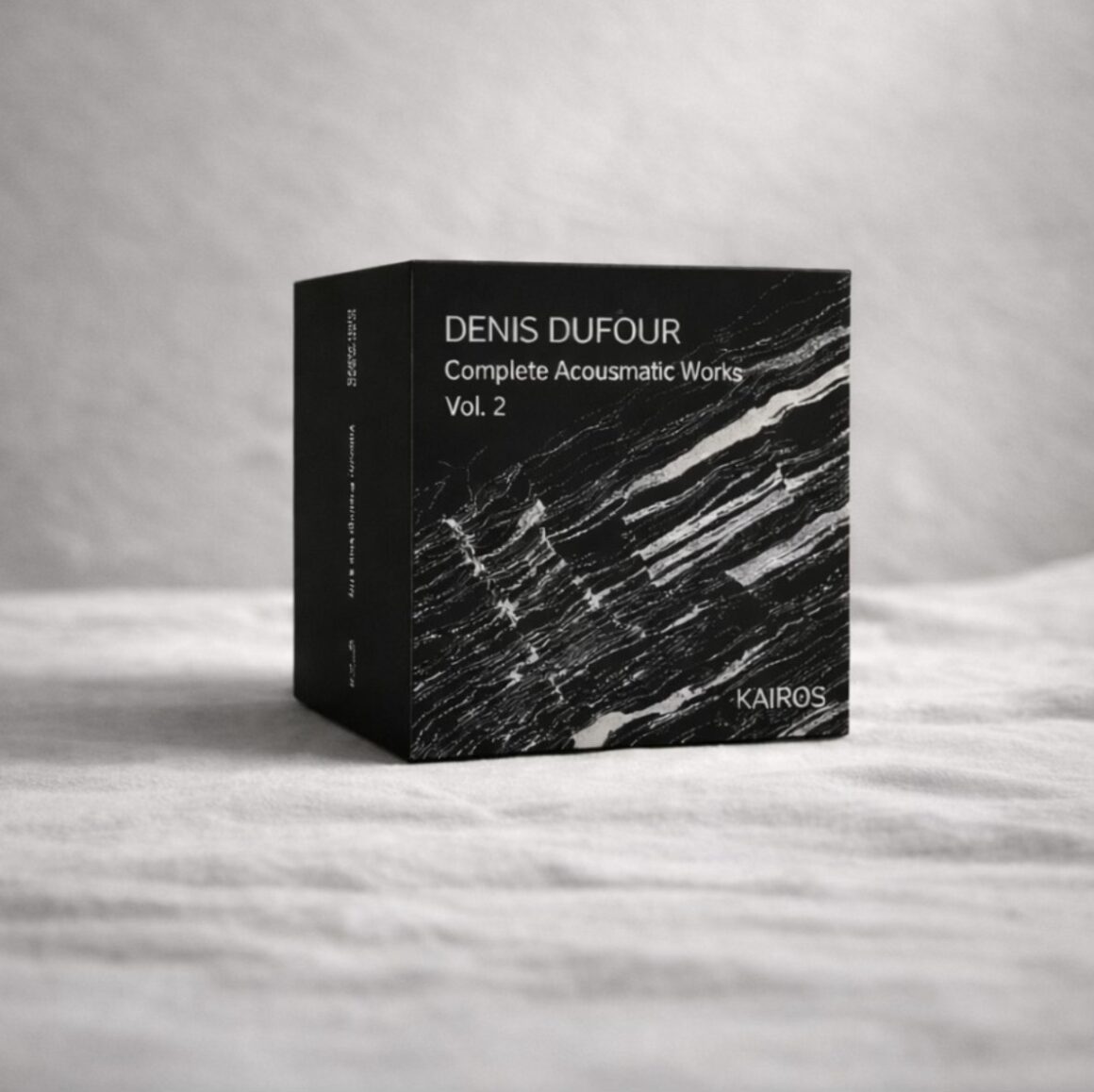 Box set of Denis Dufour's Complete Acousmatic Works Vol. 2 with black and white abstract design and KAIROS logo.