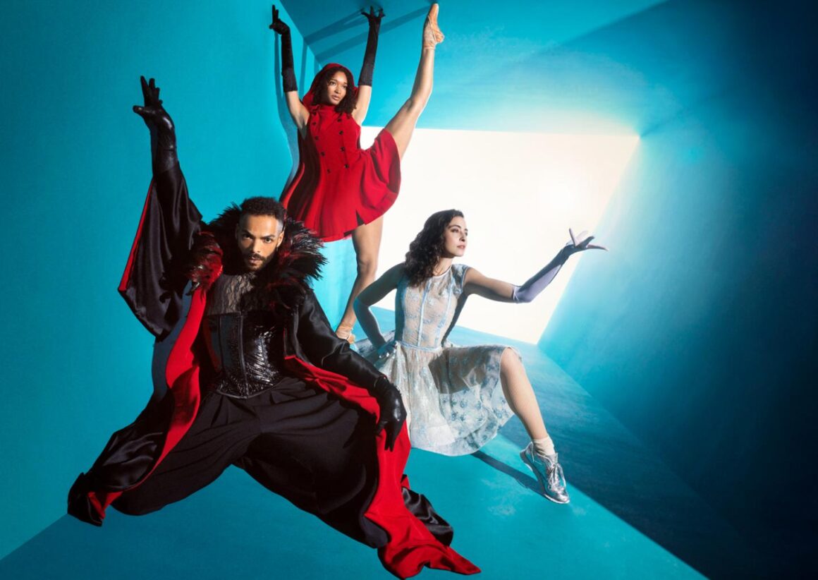Colourful promotional image for GRIMM ballet with three dancers. One male, two female, dressed in theatrical outfits, striking ballet poses in a tunnel of light in a very dramatic manner