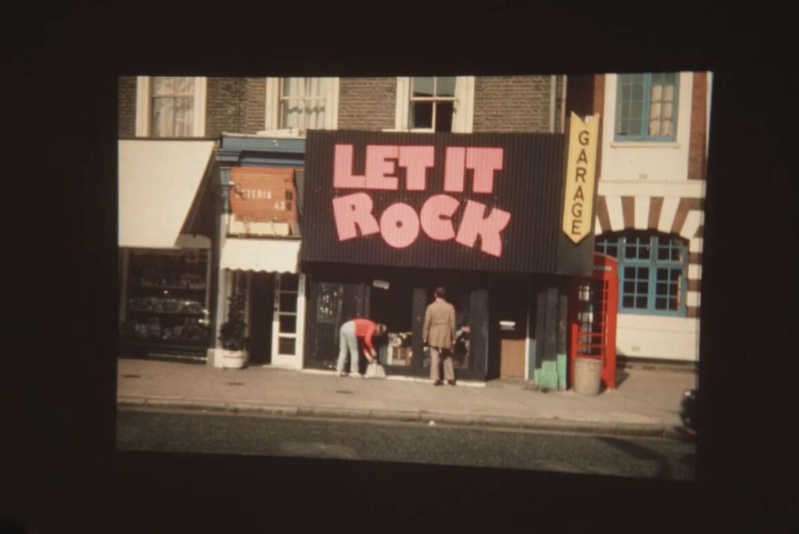 Photo of a shop from the 1970s with the title in pink outside Let It Rock