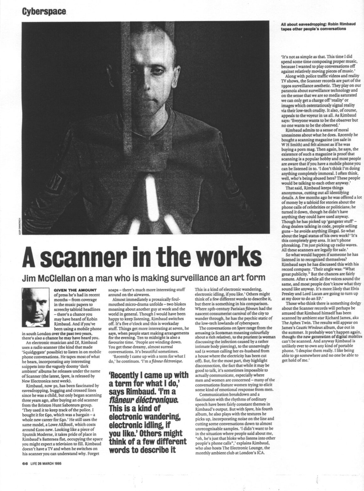 Black and white text with the title 'a scanner in the works' with a photograph a man seated, staring at the camera, with a strange aerial in front of him