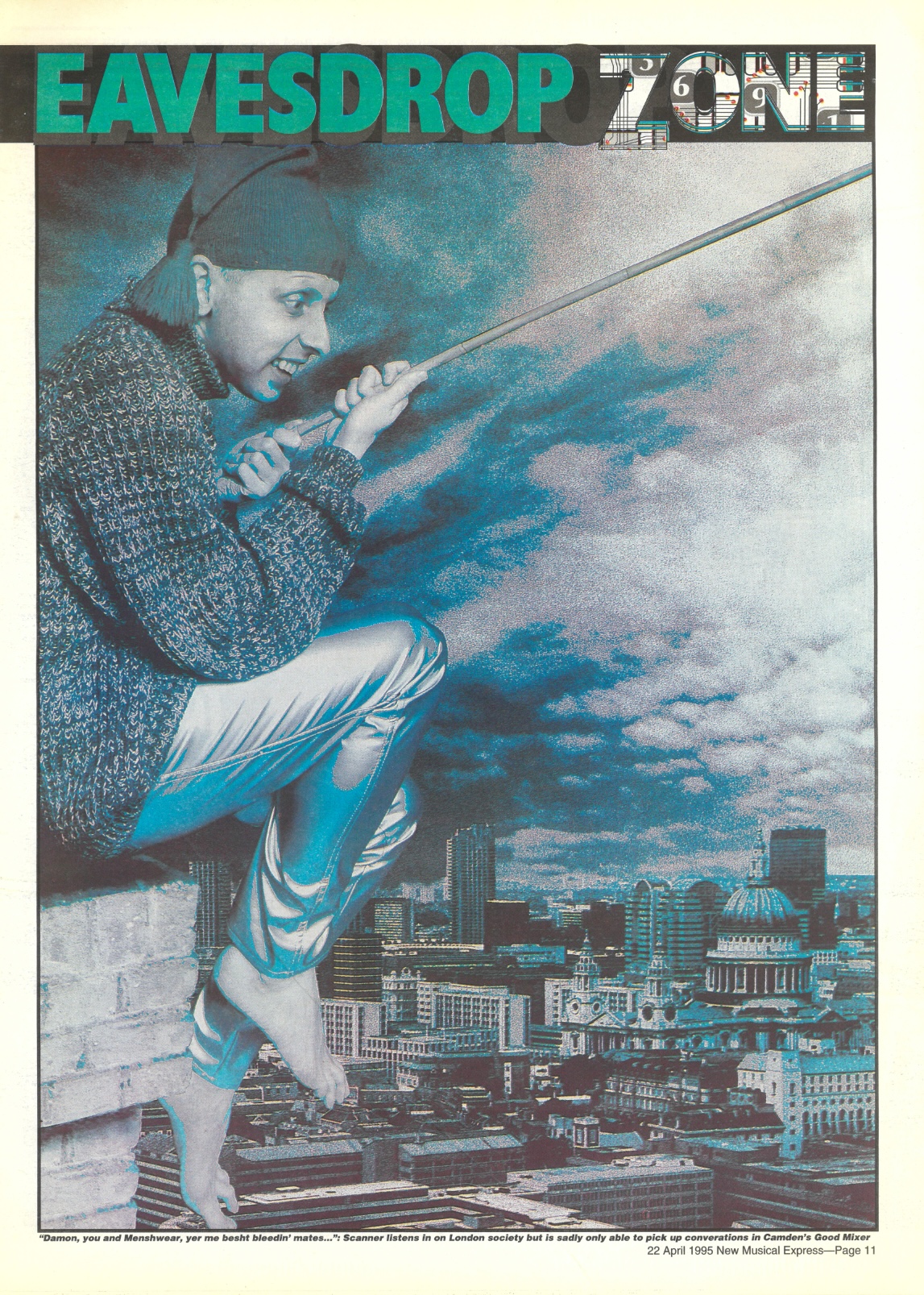 Photograph of man dressed in a large pullover, wearing silver trousers and a floppy hat, sitting on the ledge of a building holding a fishing rod, surveying the city below him